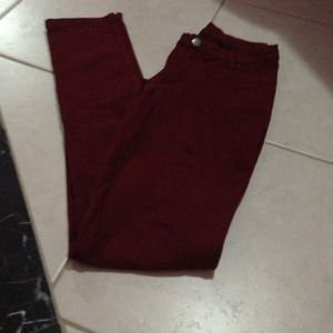 Maroon jeggings.