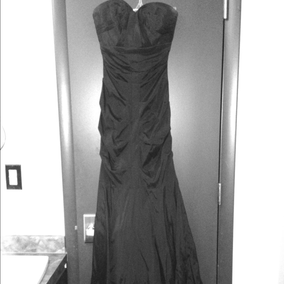 A mermaid style black formal gown. Worn once.