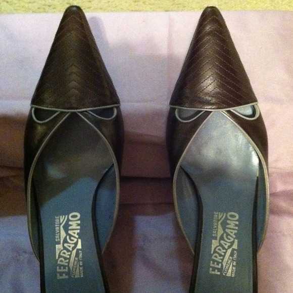 SOLD Ferragamo brown mules with light blue piping.