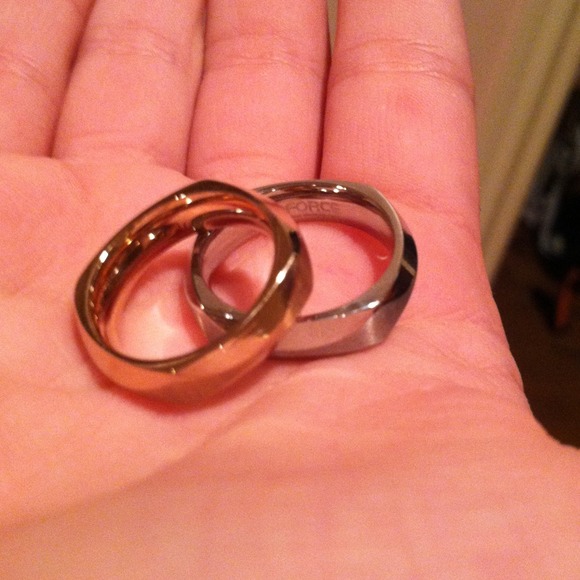 Two rings , one gold one silver ( fake )