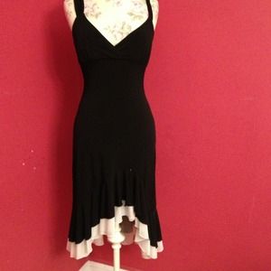 Black cocktail dress with white ruffled bottom