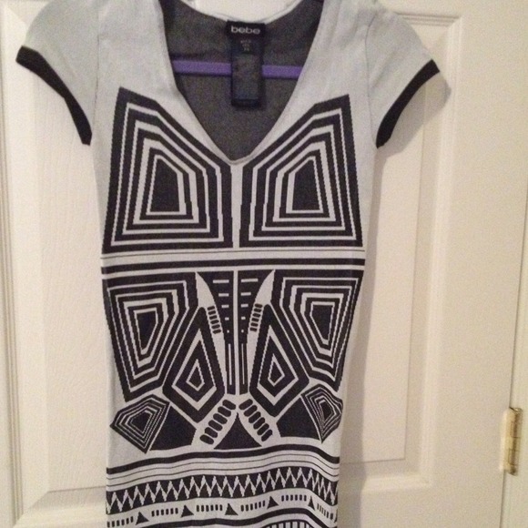 Bebe dress, stretchy, never worn. Brand new!