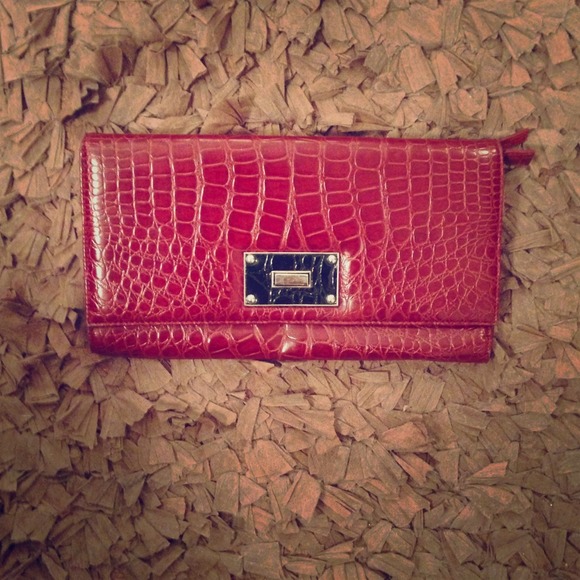 Maroon, alligator skin clutch