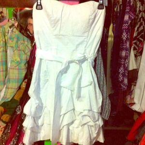 A sequin hearts strapless dress .