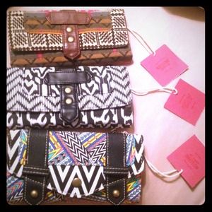 3 mossimo wallets brand new with tag on them.
