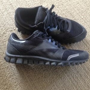 Reeboks black realflex sneakers