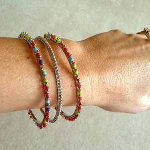 Trio of bracelets 2 colored and one silver