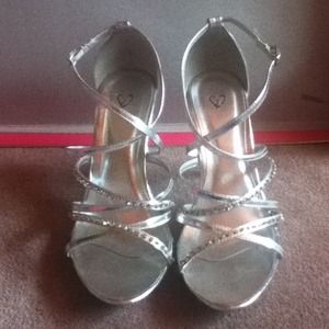 Strappy silver heels