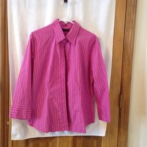 Women's pink button down blouse.