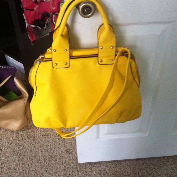 Yellow handbag w/ nautical stripes inside