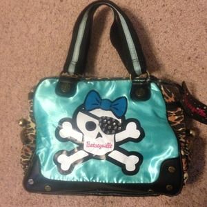 Rhinestone skull & leopard print bowling bag.