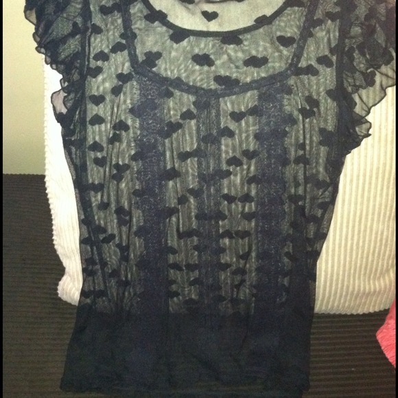 Lace , sheer baby doll style top.