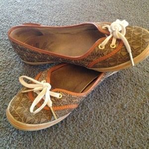 Authentic Michael Kors orange piped flats.