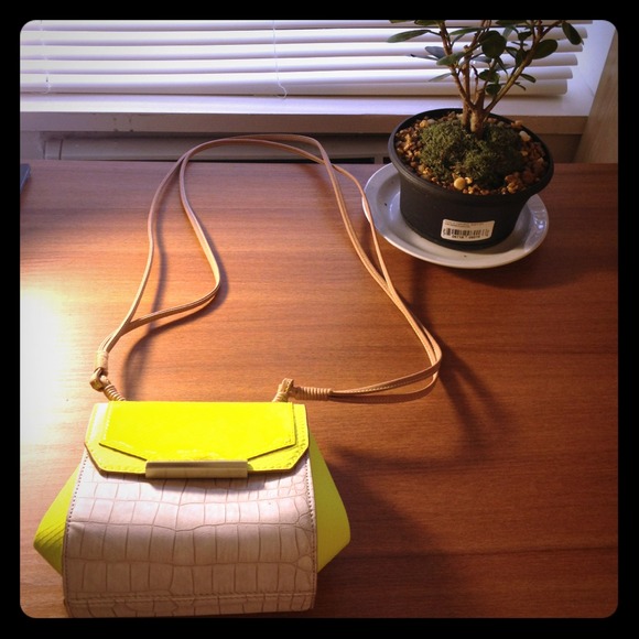 Rachel Roy electronic yellow cross body bag