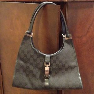 Vintage AUTHENTIC Gucci.  Black w/silver hardware.