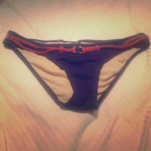 BCBG sexy bikini bottom in Large. Brand new.