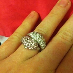 Diamond and pink dolphin ring