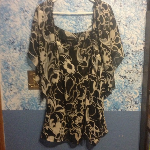 Cute flowering black blouse.