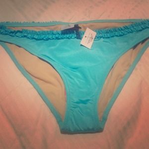 BCBG aqua ruffle cute/sexy bottom in Med. brandnew