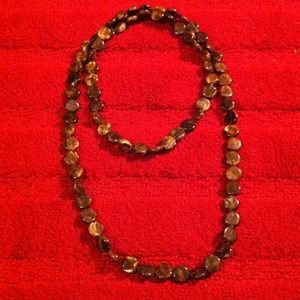 Long necklace with brown marbled flat beads