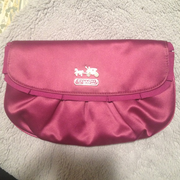 Sold Authentic Coach wristlet/clutch. NWT. $128.