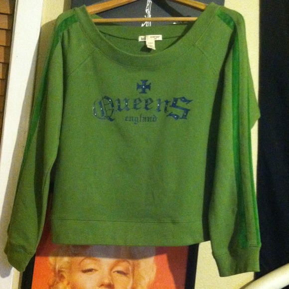 Green sweater. Says xlarge but more large-medium