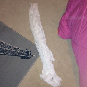 Multiway off white scarf with a subtle shimmer.