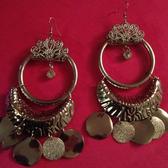 Funky silver earrings.  Never worn...