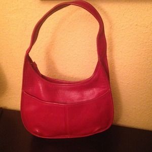 Coach red leather handbag with front pocket