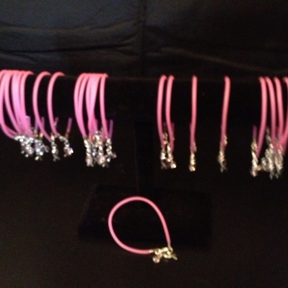 Rubber bracelet with breast cancer charm