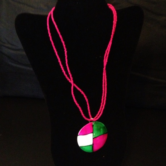 Small beaded necklace with a shell pendant