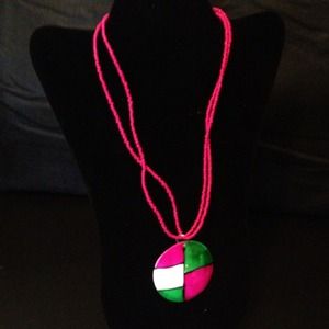 Small beaded necklace with a shell pendant