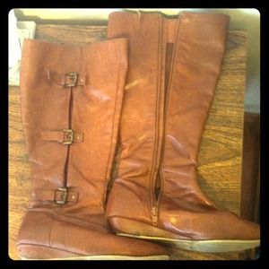 Extended calf cognac boots with buckles on side