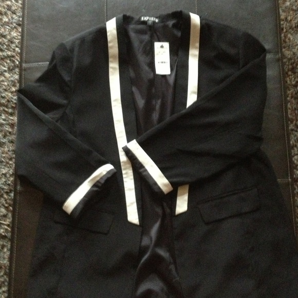 Black Express blazer with cream edging.