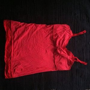 Red tank with white polka dots.