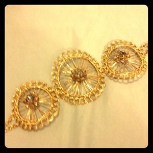 Gold, three chain circle bracelet with beading