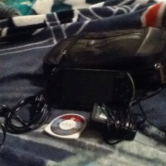 Psp with charger and little big planet and bag