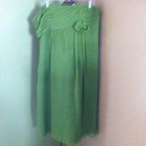 Pretty green strapless dress.