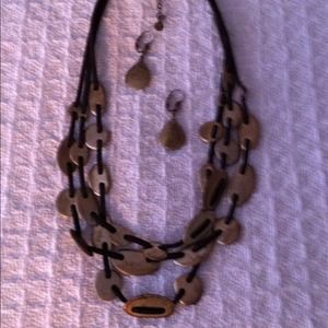 Layered necklace with earrings in bronze. Used