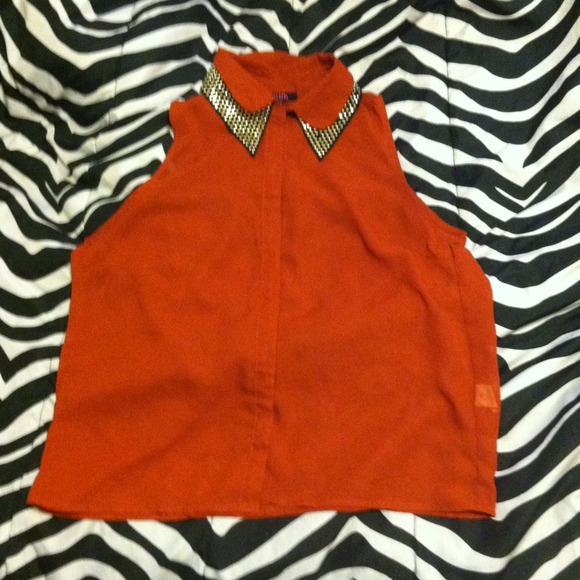 orange studded shirt