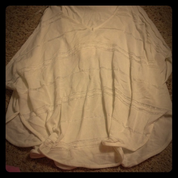 White hooded poncho
