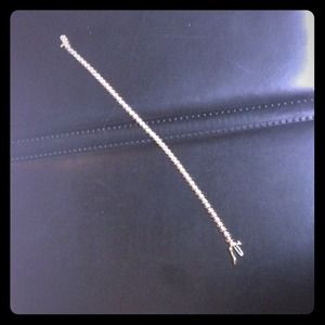 Diamond and gold tennis bracelet