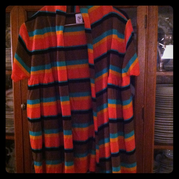 Pretty new with tags spring sweater. Size XL
