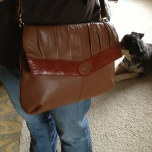 Medium size brown leather bag.