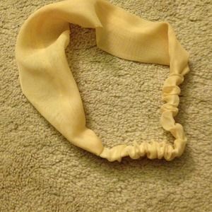 Cream colored head band.