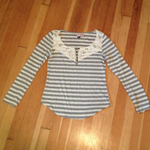 Striped blouse with lace neck line.