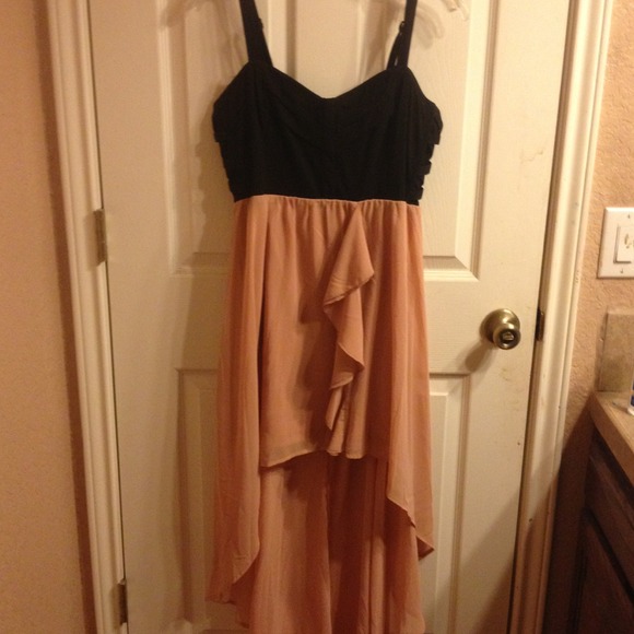A blush and black dress