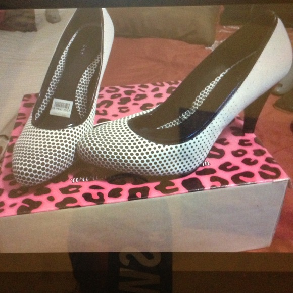 Black and white pumps