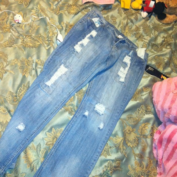Ripped light blue jeans. Worn 1 time ONLY!