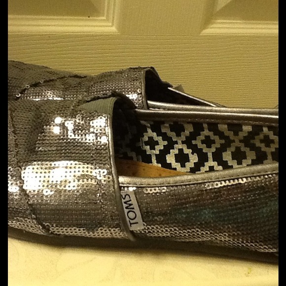 Silver glittery Toms shoes